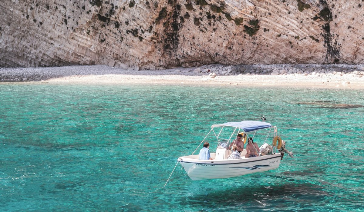 three person in boat