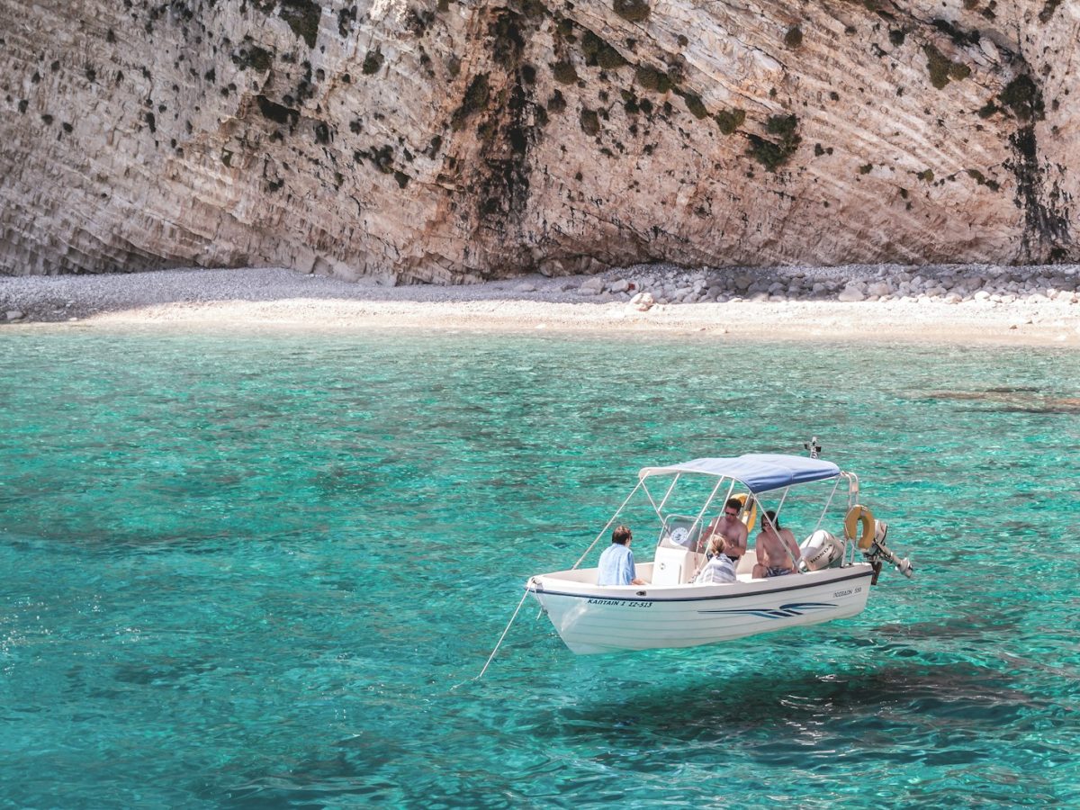 three person in boat